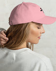 pink cap on woman model