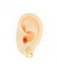 Stylish loop shaped earrings in 18K gold, a timeless addition to your jewelry