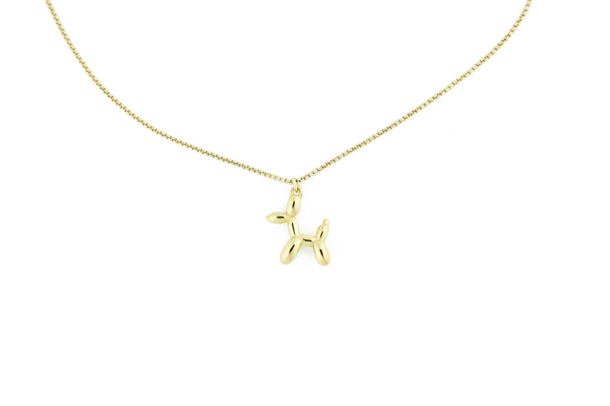 timeless gold necklace with a subtle and stylish dog design, suitable for any occasion