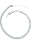 elegant silver necklace with a snake design, inspired by egyptian art

